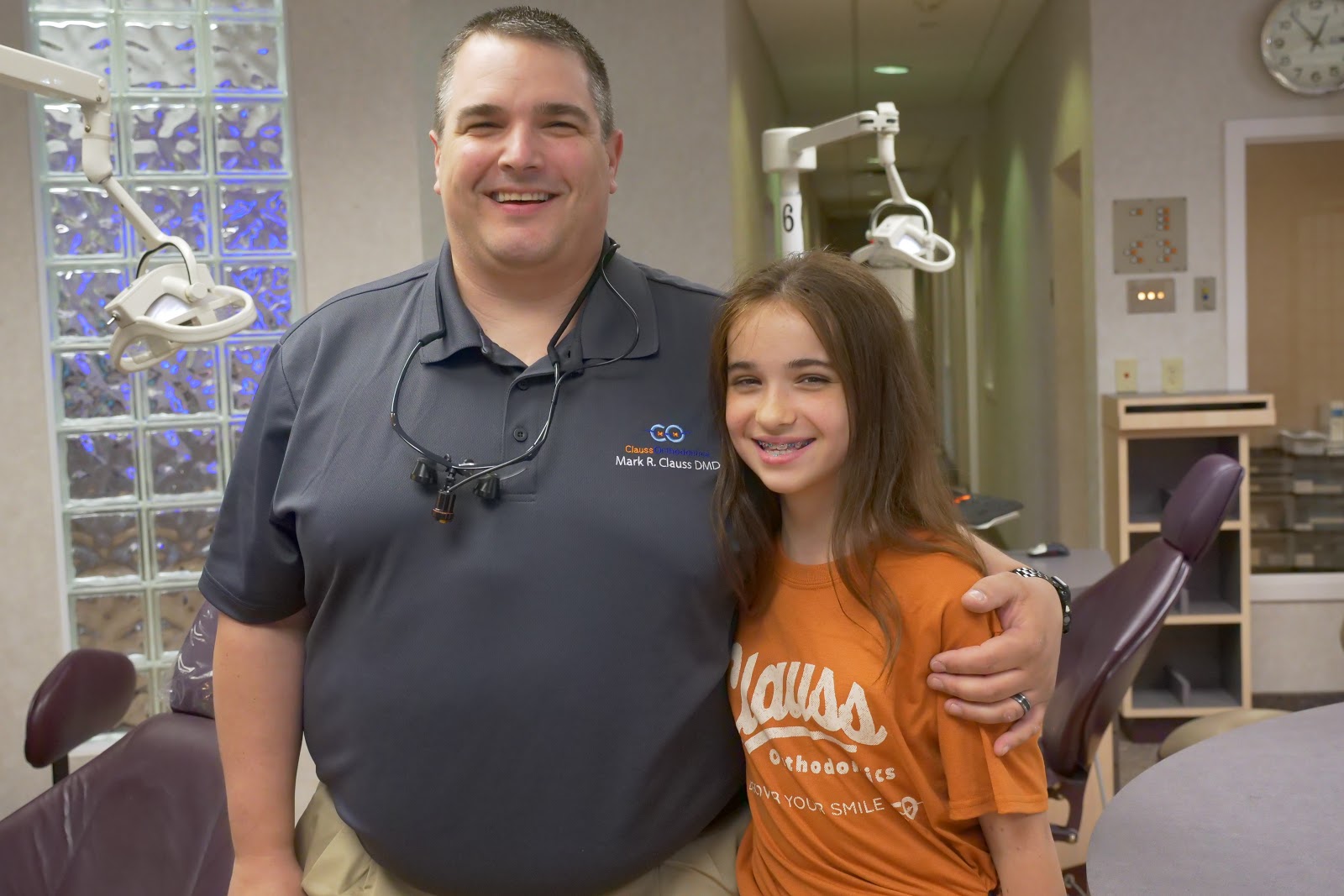 Dr. Clauss with a patient